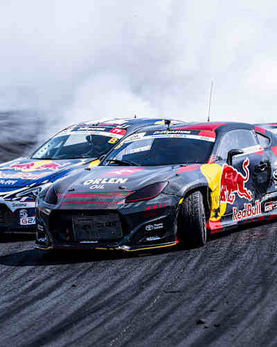 Conor Shanahan and Jakub Przygoński go head-to-head at the 2024 Drift Masters European Championship's fifth stop in Mariapocs, Hungary, thrilling with breathtaking drifts at the Rabocsi Ring