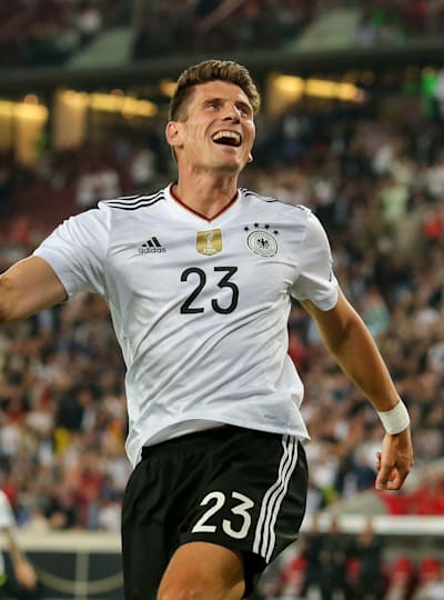 Mario Gómez celebrates scoring for the German national men's football team in a FIFA World Cup qualifier against Norway in the Mercedes-Benz Arena, Stuttgart on September 4, 2017.