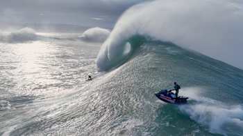 In 2024, Lucas Chianca surfs a massive wave in Nazaré, Portugal