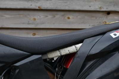 Close up of the seat on an MX bike