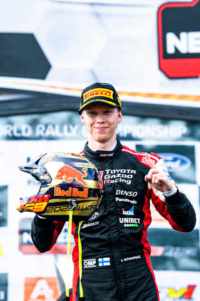 Kalle Rovanperä of team Toyota Gazoo Racing celebrates on the podium after winning their maiden FIA World Rally Championship title in Auckland, New Zealand.
