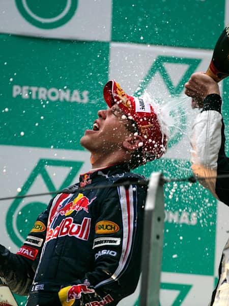 Sebastian Vettel on the podium after winning the 2009 F1 Chinese Grand Prix.