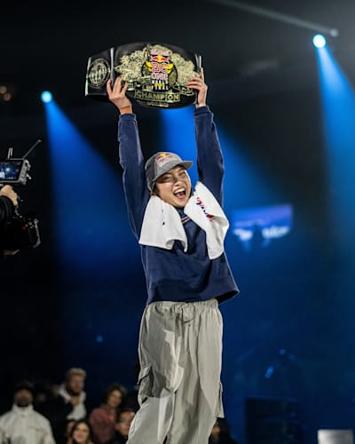 Ami of Japan celebrates with the winner's belt during the Red Bull BC One World Final at Court Philippe-Chatrier, Roland Garros, Paris, France, on October 21, 2023.