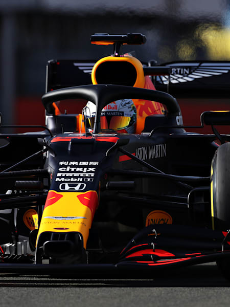 A photo of Max Verstappen in the Aston Martin Red Bull Racing RB16.