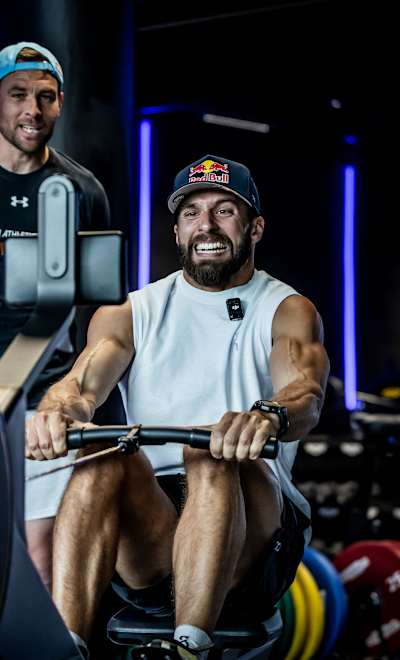 Alexander Rončević seen on a rowing machine during training for HYROX competition.