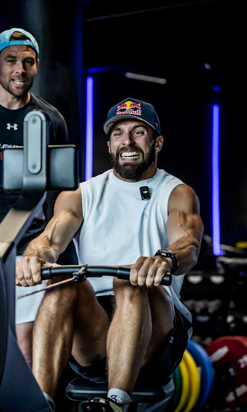 Alexander Rončević seen on a rowing machine during training for HYROX competition.