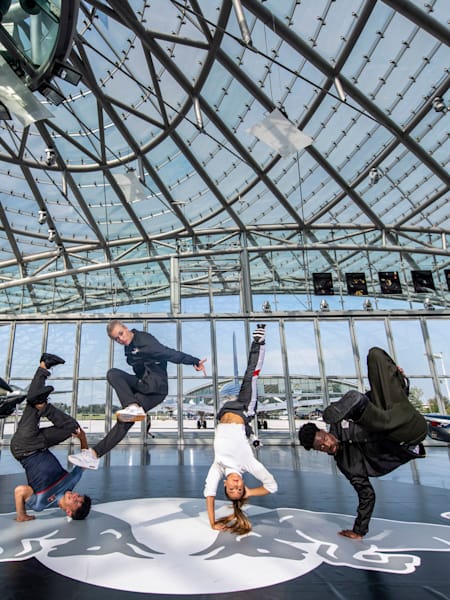 Lil Zoo, Madmax, Jilou and Zoopreme performing at Hangar-7 in the middle of Red Bull aeroplanes.