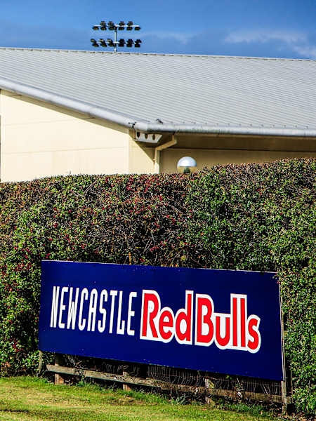 Newcastle Red Bulls exterior sign overlooking Kingston Park South Stand