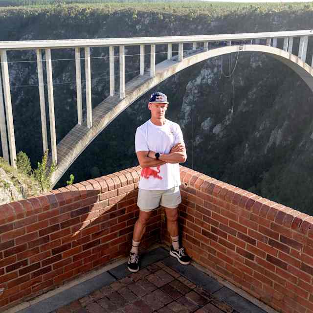 Obstacle course athlete Thomas van Tonder stands in front of Bloukrans Bridge as he prepares for a world-first challenge, tackling 600 monkey bars attached to South Africa’s highest bridge. 