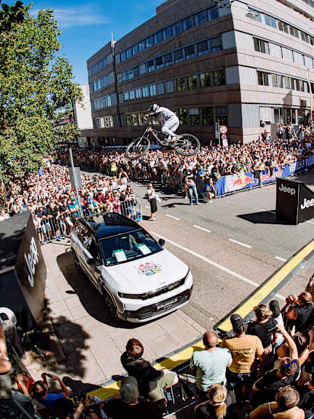 Alex Marin launches over the Red Bull Cerro Abajo course in Stuttgart, Germany, on 4 September 2026, thrilling a huge crowd during the urban downhill event