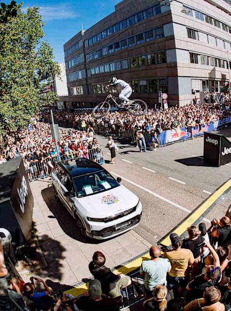Alex Marin launches over the Red Bull Cerro Abajo course in Stuttgart, Germany, on 4 September 2026, thrilling a huge crowd during the urban downhill event
