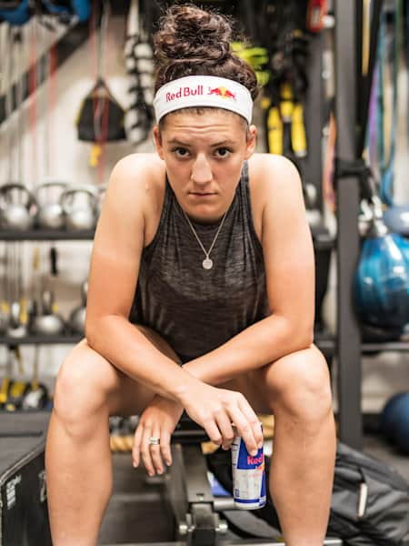 A picture of professional racing cyclist Chloé Dygert during a training session at the gym.