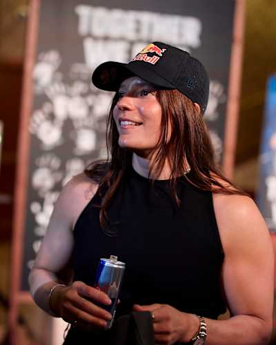 Laura Horváth pictured with a Red Bull can at the Budapest premiere of her documentary, Together we Rise, in April 2026.