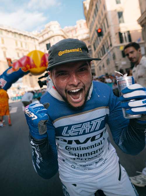 Roger Vieira pumps up the crowd at Red Bull Cerro Abajo, held at Teatro Nazionale Genova, Italy on August 24, 2025, energetically showcasing his racing spirit in Red Bull's dynamic event