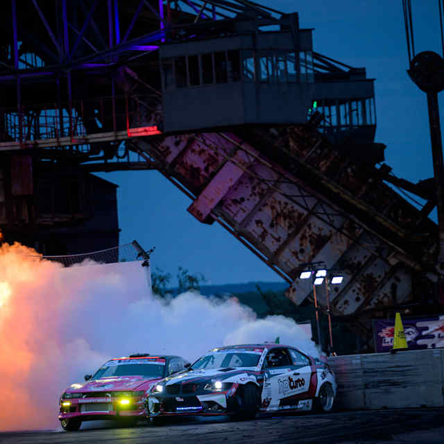 Smoke and sparks fly as competitors duel in the Drift Masters European Championship fifth stop at Ferropolis Park in Graefenhainichen, Germany, August 2023