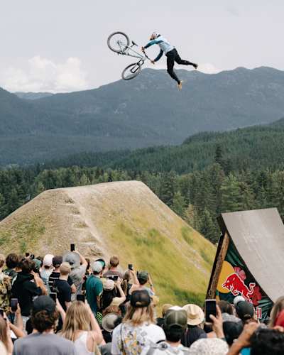 Dawid Godziek soars over ramp at Red Bull Joyride 2024 event in Whistler with an awe-inspiring mountain bike stunt