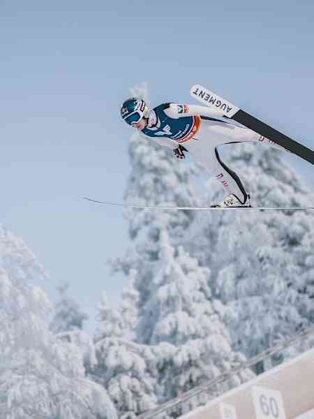 In 2023, Daniel Tschofenig soars through Ruka's snowy skies.