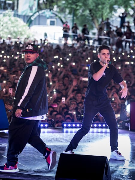 Mc Wos and Mc Aczino perform during Red Bull Batalla de Los Gallos World Final at Club Hipico Argentino in Buenos Aires, Argentina on December 09, 2018.