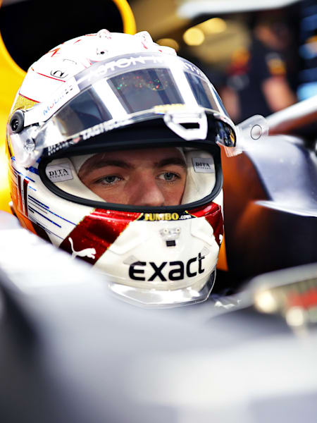 Max Verstappen prepares to drive in the garage during qualifying for the F1 Grand Prix of Abu Dhabi at Yas Marina Circuit on November 30, 2019 in Abu Dhabi, United Arab Emirates.
