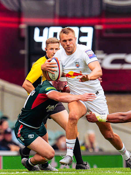 Chris Harries carries against Leicester Tigers in the PREM Rugby Cup