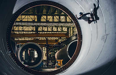 Danny Leon does a fakie thruster in a wind turbine at a warehouse in Avilés.