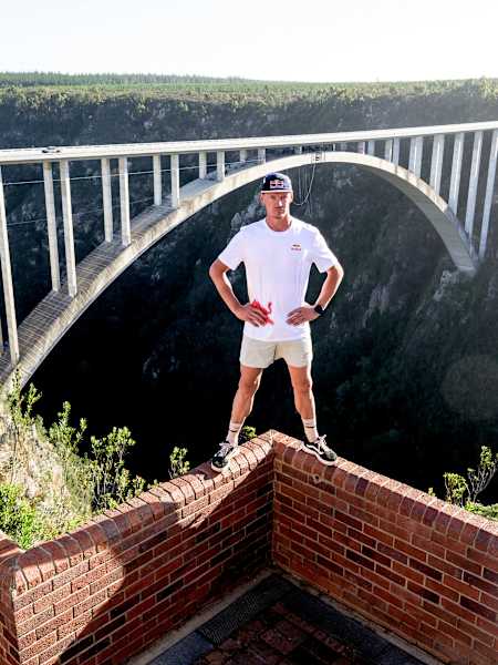 Thomas Van Tonder stands above the Bloukrans Bridge in South Africa while preparing for Red Bull Bridge Bars. 