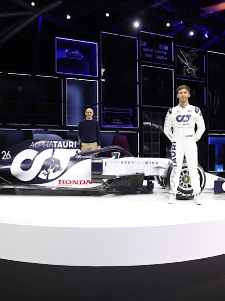 Daniil Kvyat and Pierre Gasly pose for a photograph during the Scuderia AlphaTauri AT01 Livery launch on February 14, 2020 in Salzburg, Austria.