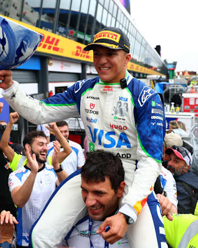 Isack Hadjar celebrates his first podium