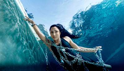 Khare underwater, a nod to her death-defying Houdini stunt.