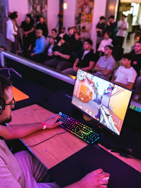 Participants gaming during the Red Bull Home Ground National Final at Vilvoorde, Belgium May 27, 2024. 