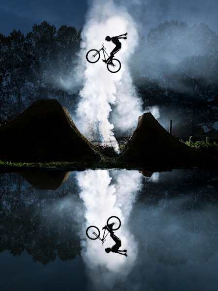 Jean-Baptiste Liautard, France, joins the big leagues with this mirrored shot of Jeremy Berthier at his trail in Bourgoin-Jallieu, France.