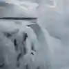 Will Gadd above an extremely icy Niagara Falls