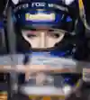フォーミュラカーのコックピットで凛とした表情を見せるリンゼイ・ボン