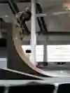 Jake Wooten stalls a big front blunt on the Atrium quaterpipe									