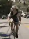 Nico Deportago-Cabrera riding his bike in a Red Bull helmet on the way to Onion Valley, California.