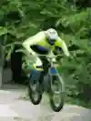 Rob Warner and Tom Oehler demonstrate their MTB pumping techniques on a trail.