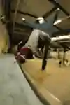 Jamie Foy Frontside Nollies into a Fakie 5-0 on the quarterpipe coping during the Drop In Tour demo