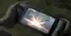 The Switch in handheld mode, with Link in action