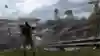 A screenshot of a character overlooking a map in Apex Legends