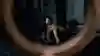 A woman deadlifting weights in the gym