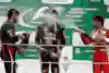 Vettel and Alonso shower Webber with champagne