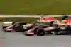 Daniel Ricciardo és Danyiil Kvjat fej-fej mellett Infiniti Red Bull Racing team-mates Daniel Ricciardo and Daniil Kvyat racing wheel to wheel at the Malaysian Formula One Grand Prix.