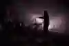 Team Vestas Wind sails with a lightning storm