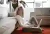 Gett off the couch and onto the floor.