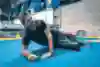 Jamie Whincup foam rolling at the Gold Coast Titans High Performance Centre, Australia.