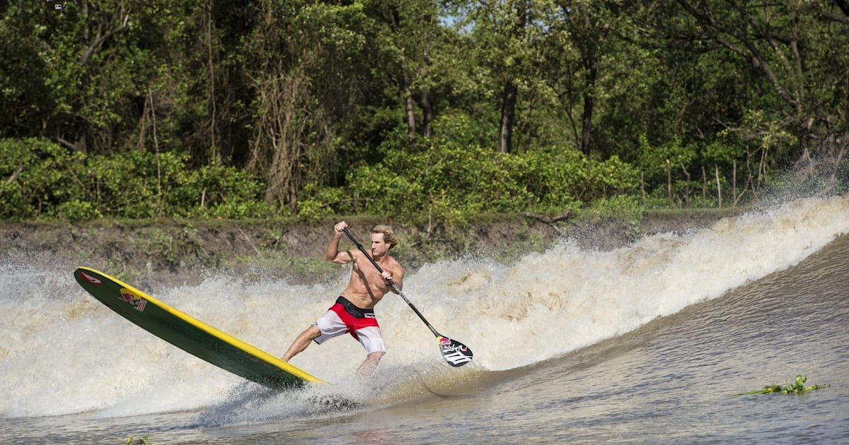 Robby Naish does stand up paddling on the Amazon