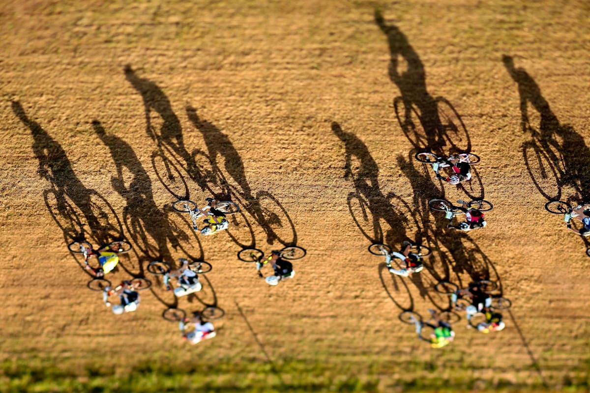 Cyclists chase their shadows in a French road race 