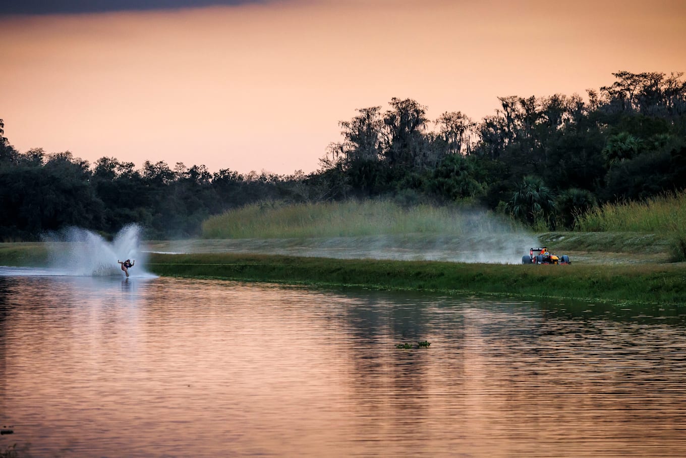 Parks Bonifay barefoot water skis behind the Oracle Red Bull Racing RB7