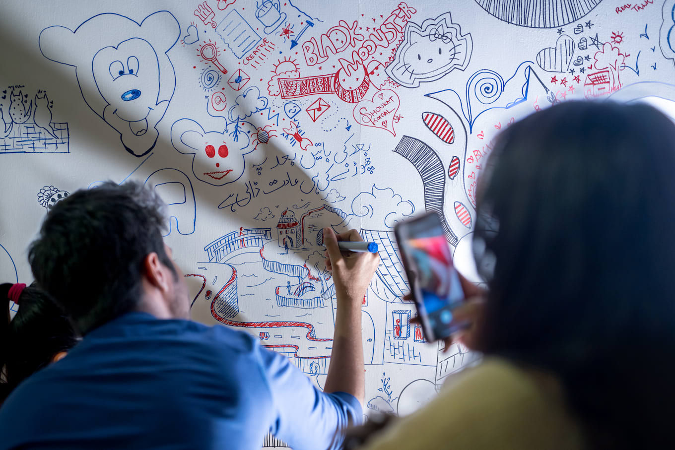 The participants doodling at National Final while awaiting results