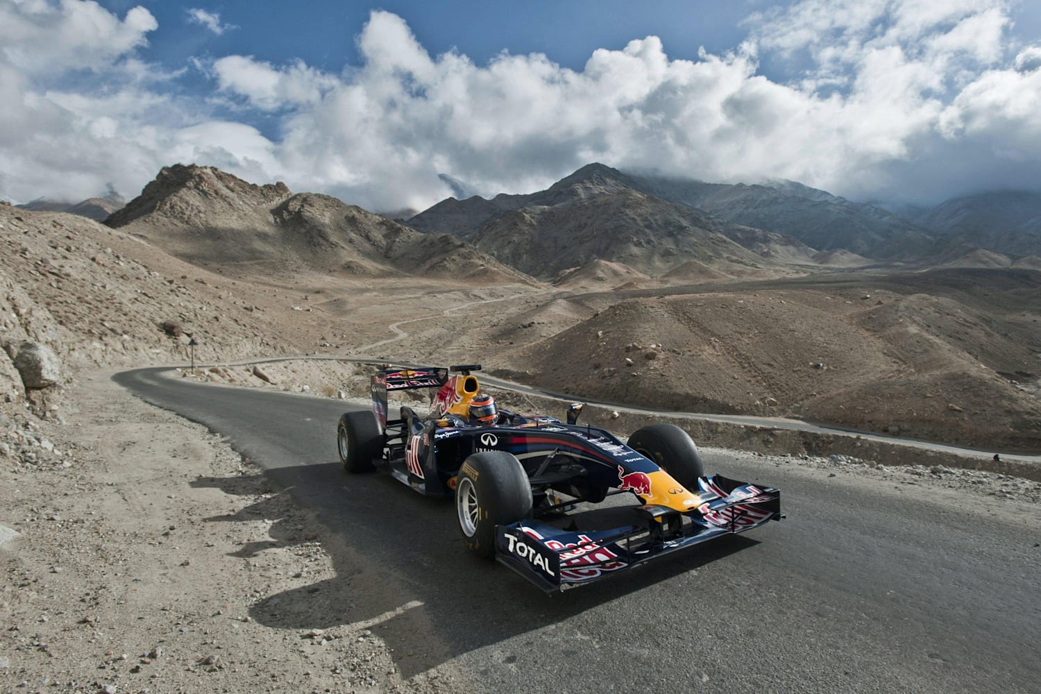 F1 Race Car Versus Supercar